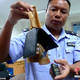 Image for article titled Chinese Test Cheating Tools Look Like Something Out Of James Bond